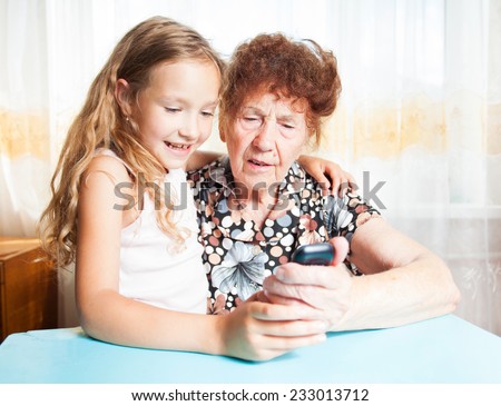 Senior with girl. Generation. Elderly woman with great-grandchild