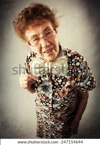 Merry old woman. Happy fun granny. Adult funny female on party