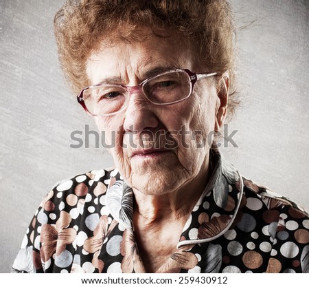 Portrait  old woman. Sad adult female. Grandmother