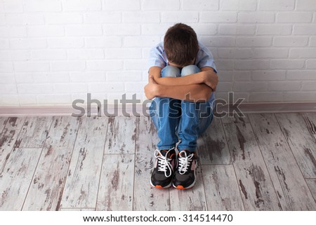 Sad teenager. Problems at school. Grief boy