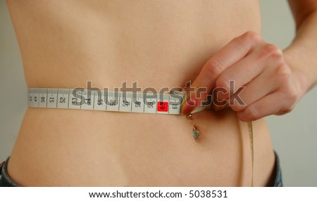 stock photo : Female waist being measured