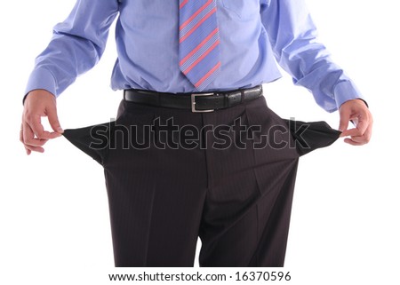 stock photo : The gone bankrupt businessman stands with the turned out pockets