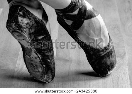 Well Worn Black Ballet Shoe, Black and White in studio