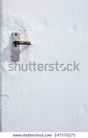 a simple white metal door