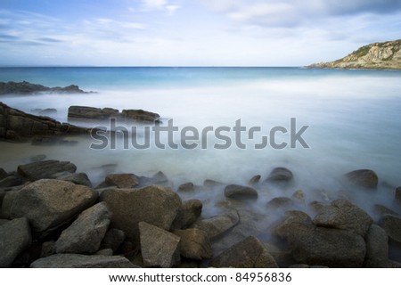 Long -Time Exposure of the Beach Rena Bianca -St. Teresa on a stormy summer day - Sardinia, Italy