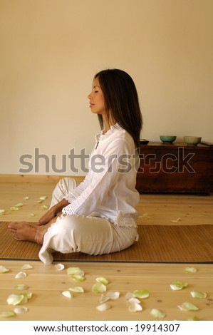 Young woman relaxing, side view