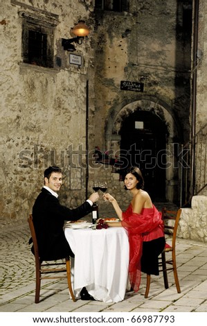 couple having dinner in an old rural village