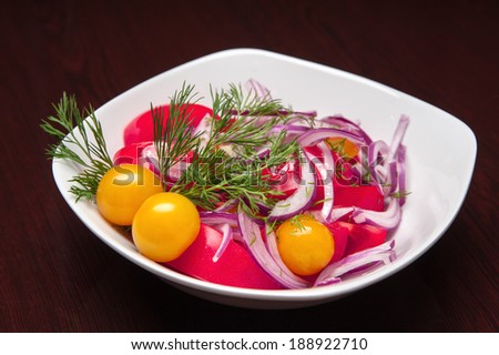 The menu - photo - fresh salad from tomatos, onions, cherries-tomato etc