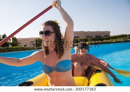 woman floating on an inflatable boat