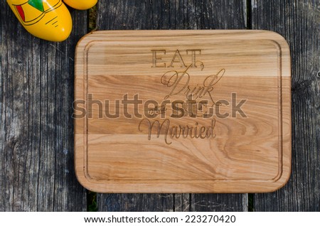 Engraved wood cutting board stated \