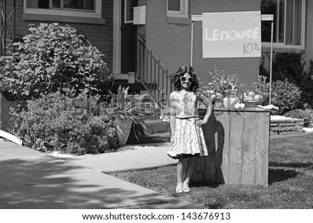 vintage girl with lemonade stand in black and white