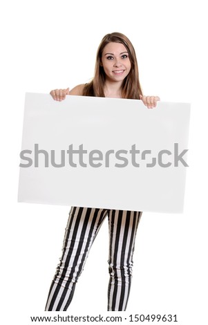 teen girl with stripe pants holding blank sign