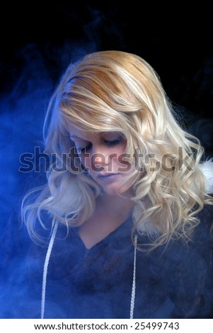 Ice woman dreaming with blue smoke
