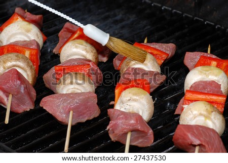 cooking beef kabobs on barbecue 