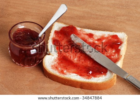 bread and jam with knife