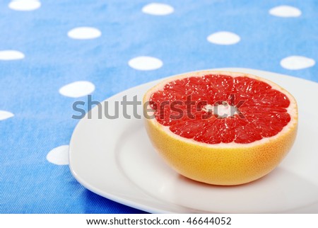 red grapefruit on a plate