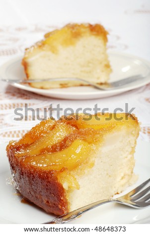 two slices of upside down pear cake