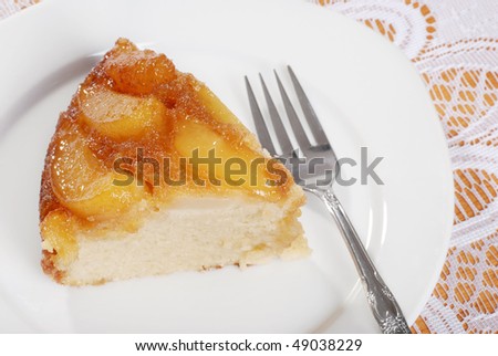 top view slice of upside down pear cake