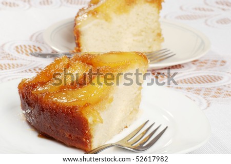 closeup of two slices upside down pear cake