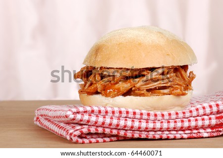 closeup barbecue pulled pork sandwich