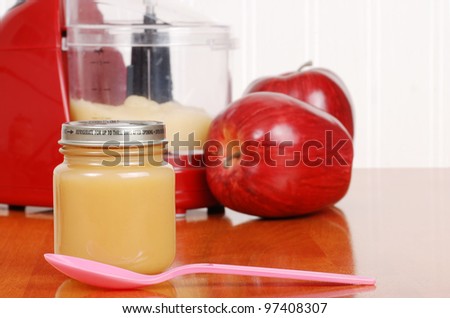 homemade apple sauce baby food with spoon