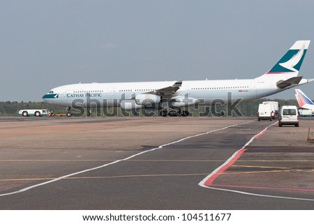 DOMODEDOVO, RUSSIA - SEPTEMBER 1: Aircraft operated by Cathay Pacific Airways, taxis at Moscow airport in Domodedovo on September 01, 2011. The company in its fleet has 11 Airbus aircraft A340-500
