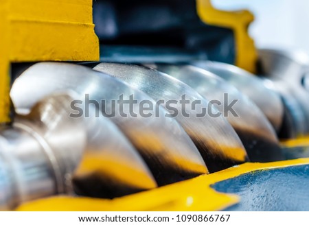 Cross section of the air compressor. Rotor of air screw compressor. Close-up photo. Shallow depth of field.