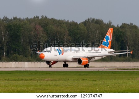DOMODEDOVO, RUSSIA - SEPTEMBER 01: Aircraft operated by Wind Jet, take off in Moscow airport in Domodedovo on September 01, 2011. On 11 August 2012, the airline has ceased operations.