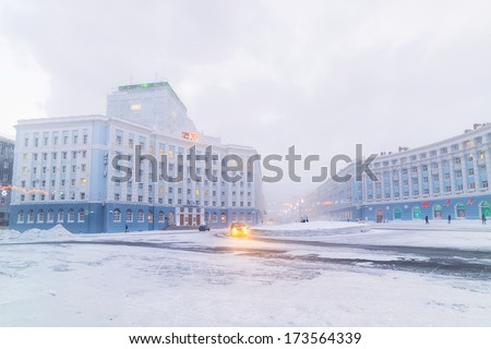 NORILSK, RUSSIA - JANUARY 06, 2014: Severe frost in Norilsk. Electronic display in the town square shows the temperature -46 degrees below zero.