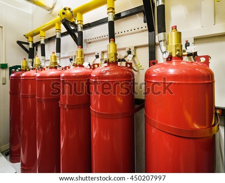 Cylinders and pipe fittings of industrial extinguishing system.