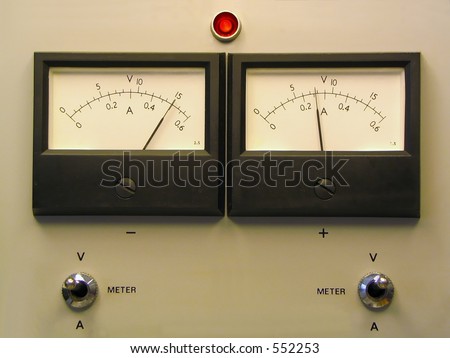 Front of a laboratory power supply showing dual readout panel meters