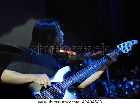 MELBOURNE - DECEMBER 7: Dream Theater in concert at The Palais Theatre. Close-up of bass player John Myung. December 7, 2009 in Melbourne.