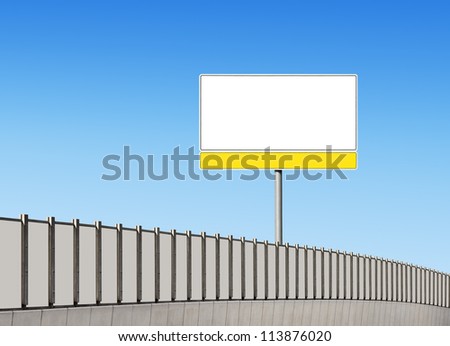 Blank traffic sign and noise barrier fence on the highway