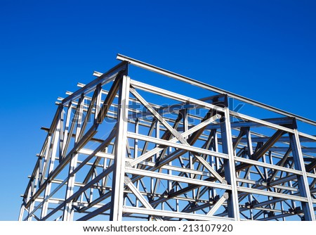 metal frame of the roof against the blue sky