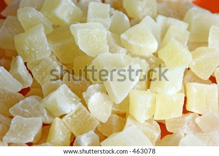 A healthy snack - small chunks of dried pineapple, detailed photo of the chunks. See my portfolio for an isolated version on white background.