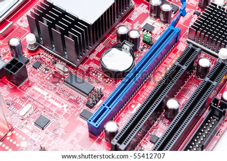 Detail of modern computer mainboard isolated on white background