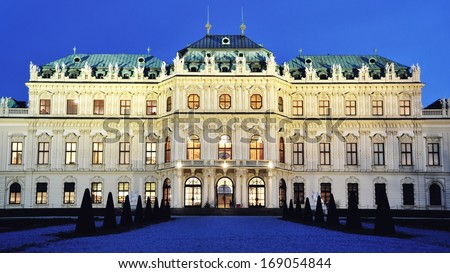 Full view of a baroque Upper Palace in historical complex Belvedere, Vienna, Austria at night in winter. It is a popular touristic attraction with famous museum and beautiful park