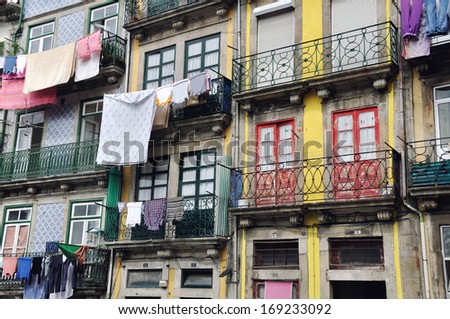 Colorful old houses of Porto, Portugal with hanging clothes