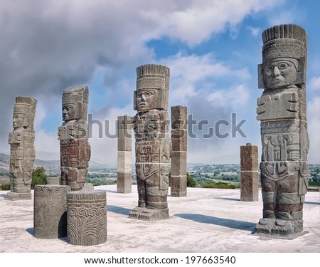 Toltec Warriors - Atlantes - columns topping the Pyramid of Quetzalcoatl in Ancient ruins of Tula de Allende - archaeological site in Hidalgo, Mexico