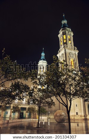 Cathedral of Our Lady of Pillar at night - a roman catholic church in Saragossa, Aragon, Spain. The Basilica venerates Blessed Virgin Mary and is one of the biggest churches in the world