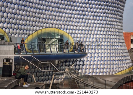 BIRMINGHAM, ENGLAND - SEPTEMBER 2, 2014: People in front of Selfridges Building designed by architecture firm Future Systems. It\'s futuristic design is significant