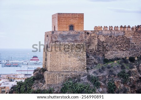 Tower of Alcazaba of Almeria is a fortified complex in Andalusia, Spain. View at the port and sea