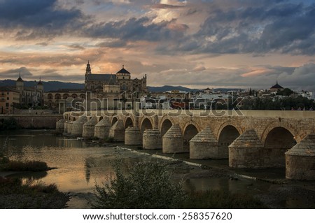 Roman bridge and La Mezquita at sunset in Cordoba, Andalusia, Spain
