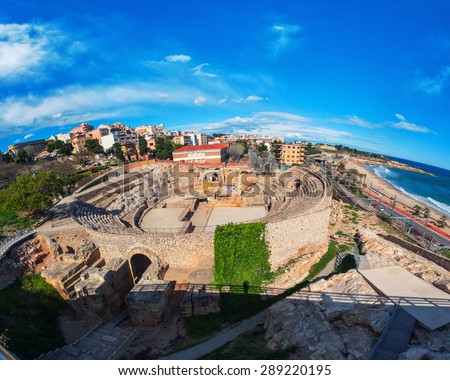 Coastline of Tarragona, Spain with sea and old roman theater ruins. Fish-eye
