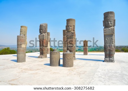 Toltec Warriors - Atlantes - columns topping the Pyramid of Quetzalcoatl in Ancient ruins of Tula de Allende - archaeological site in Hidalgo, Mexico
