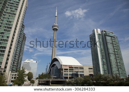 TORONTO - AUGUST 6, 2015: The Rogers Center and the CN Tower are key architectural features that figure prominently in Torontos cityscape.
