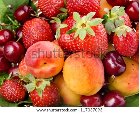 fresh fruits and berries mixed collection surface close up macro shot