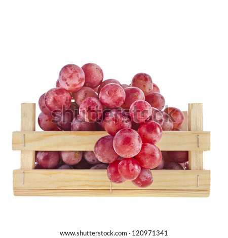grapes in a wooden crate box isolated on a white background