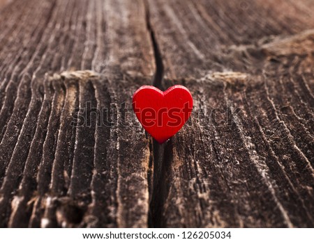 symbol of love is in trouble, the crack break of wood texture, valentines day card concept