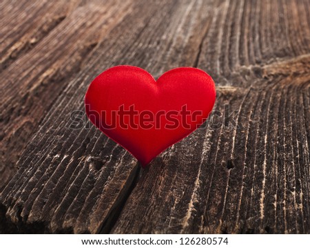 Love heart on crack break wood texture background, valentines day card concept